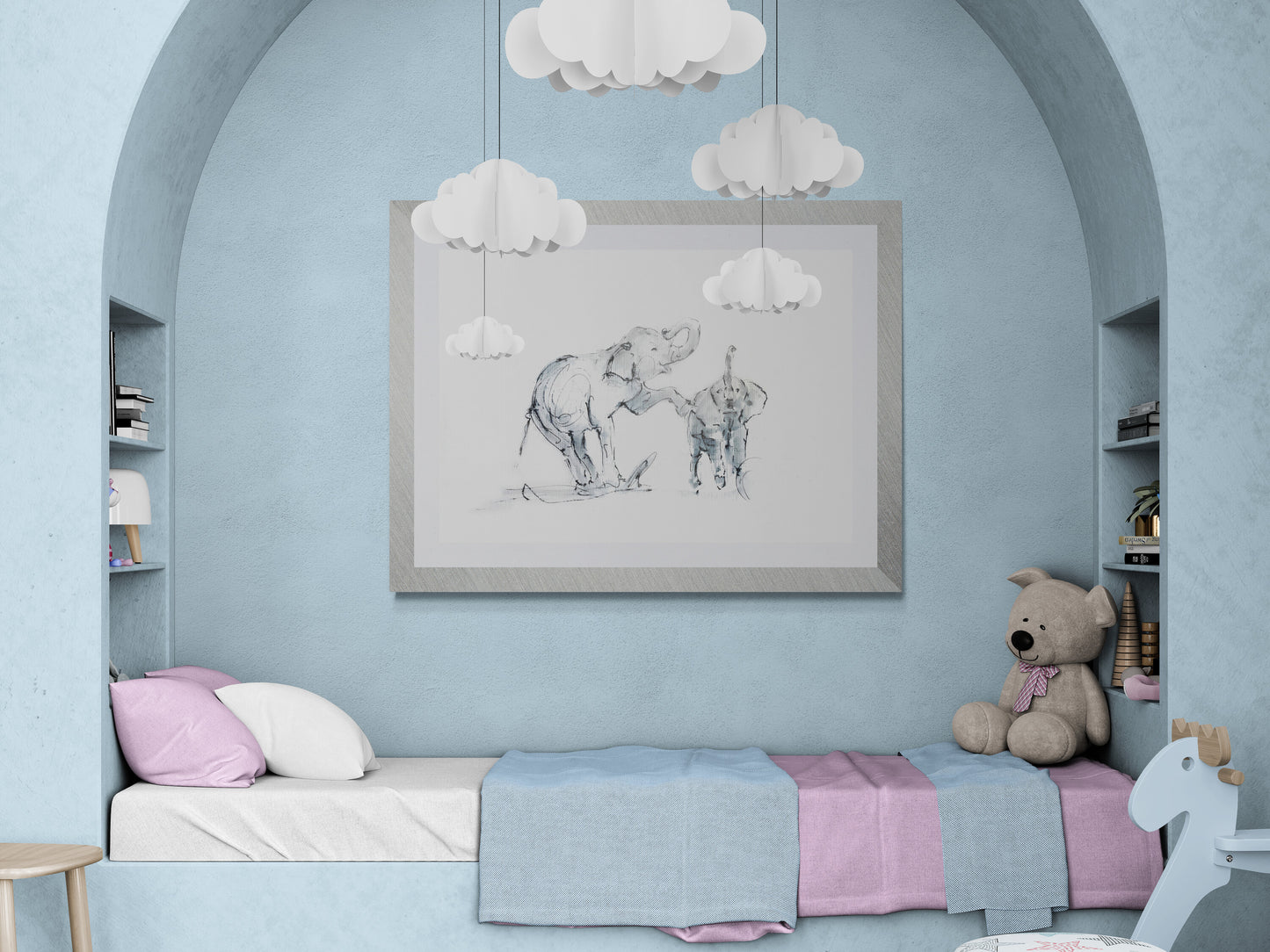 Elephant family nursery wall art print by Wendy Laverick displayed framed in a soft pastel children's bedroom interior